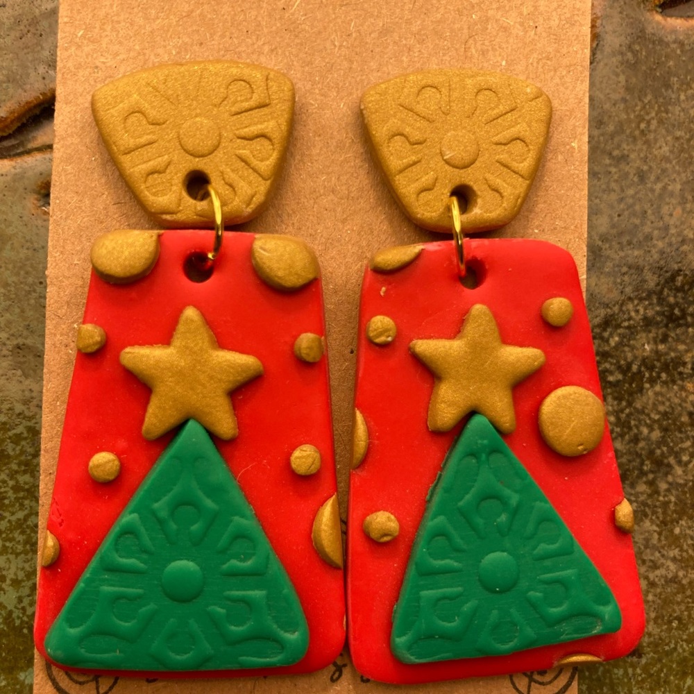 Christmas tree dangles red, gold, and green
Perfect for the Christmas season!
